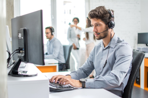 Operative manning a support desk