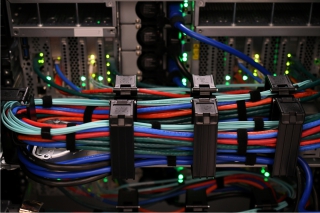 Close up of a server with network cables