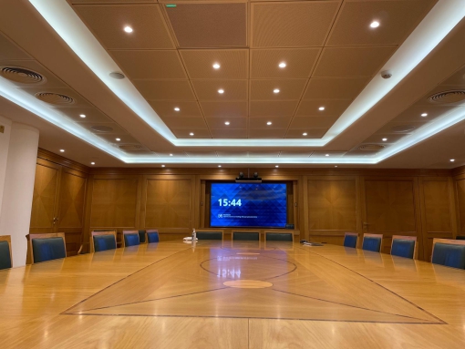 Boardroom at AELTC Wimbledon with large table and audiovisual equipment,