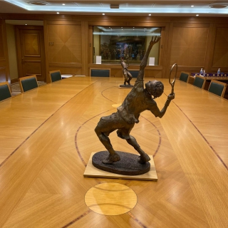 stature on boardroom table