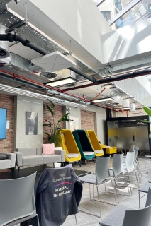 Fitting audio system in atrium