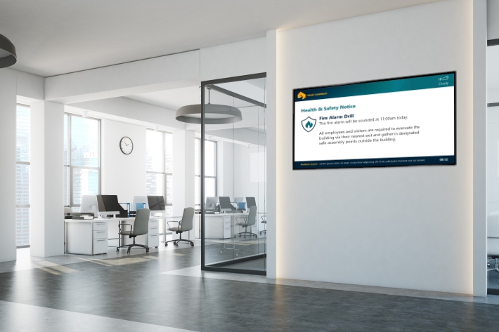 Digital signage outside a meeting room.