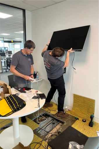 Gallery 33 Technicians installing audiovisual technology at BCS Swindon