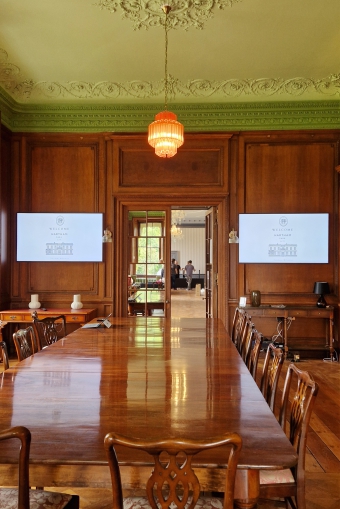 Gallery 49 a view of two digital screen displays in the Library at Hartham Park.