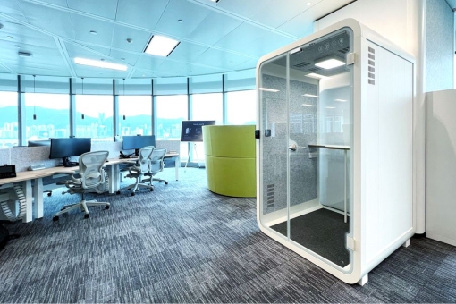 Smart meeting booth in a bright, modern office space,